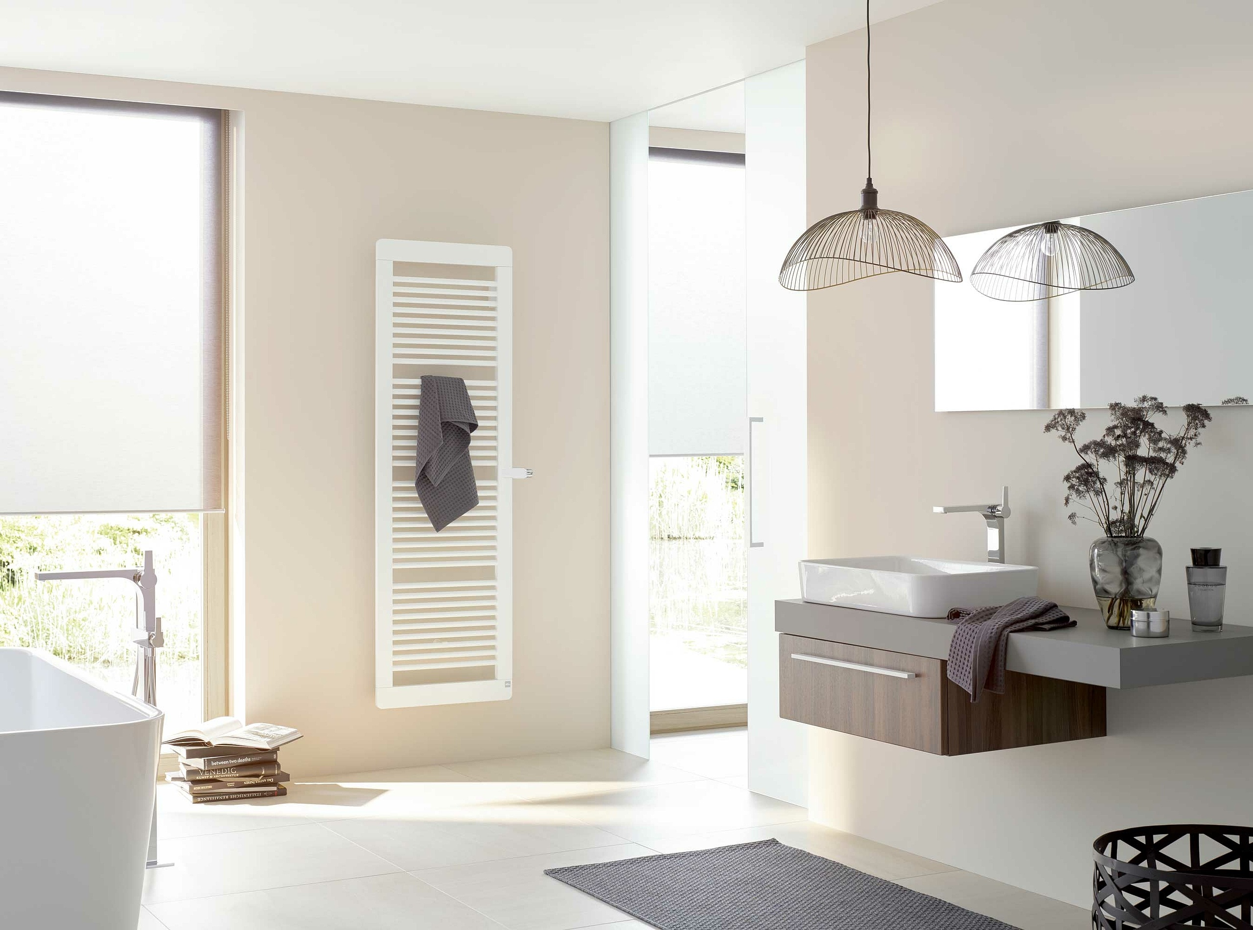 Kermi Credo plus design and bathroom radiators with slender heating pipes. 